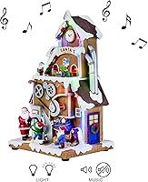Vista 4 de Santa's Workshop Animado Aldea de Navidad Momentos en el tiempo Luces LED, música y escena en movimiento Pintado a mano Poliresina Edificio