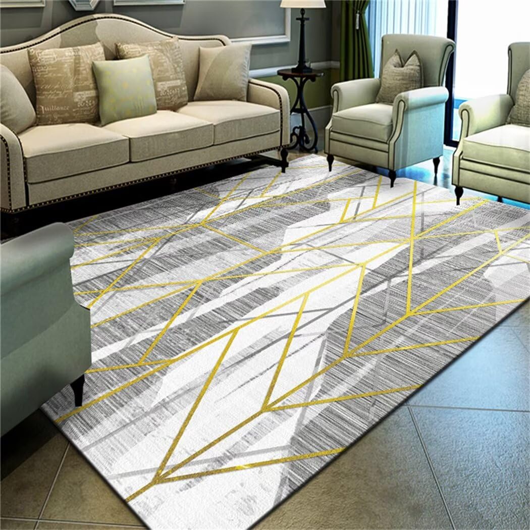 Tapis de salon moderne aux finitions or et gris
