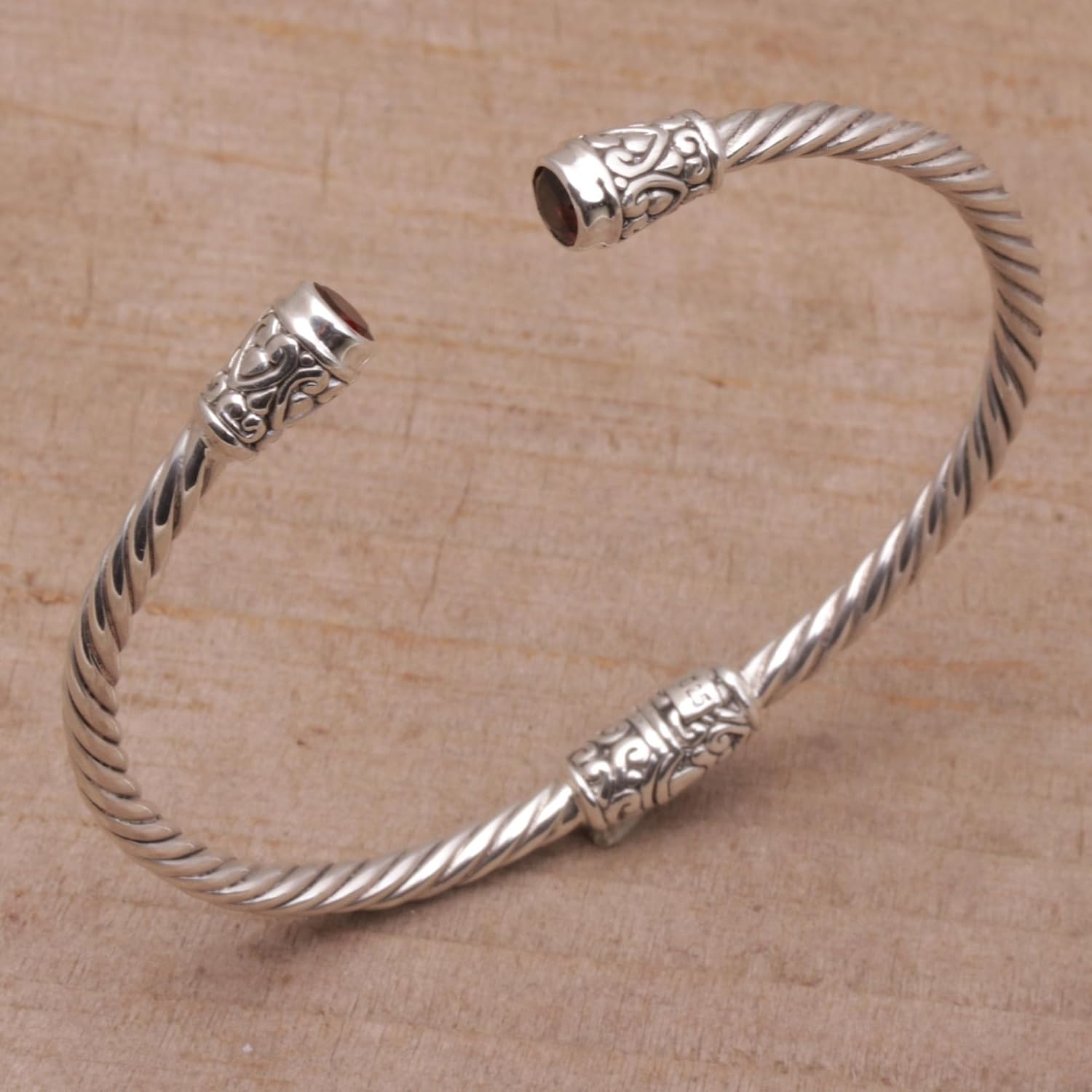 NOVICA Artisan Handmade Garnet Cuff Bracelet | Sterling Silver | Bali Red Indonesia Birthstone | 6" L x 0.2" W | 'Spiral Temple'