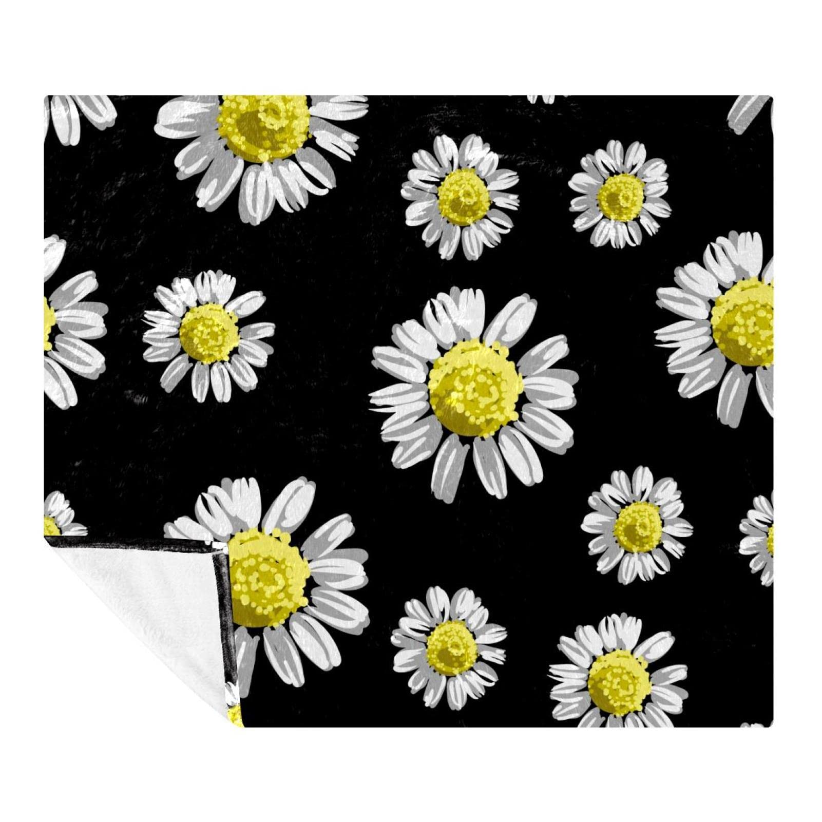 Couverture douce Chamomile Daisy, le plaid polaire idéal contre le froid sur le canapé