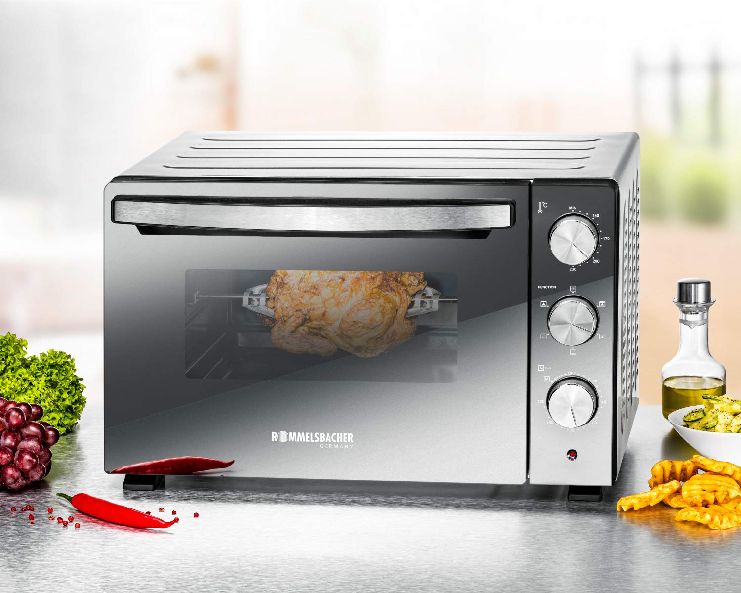 ROMMELSBACHER Back & Grill Ofen BGS 1500 - energiesparend & effizient, Backraum antihaftbeschichtet, 6 Heizarten, Drehspieß, 120 Min. Zeitschaltuhr, Doppelverglasung, silber, 1500 W, Edelstahl