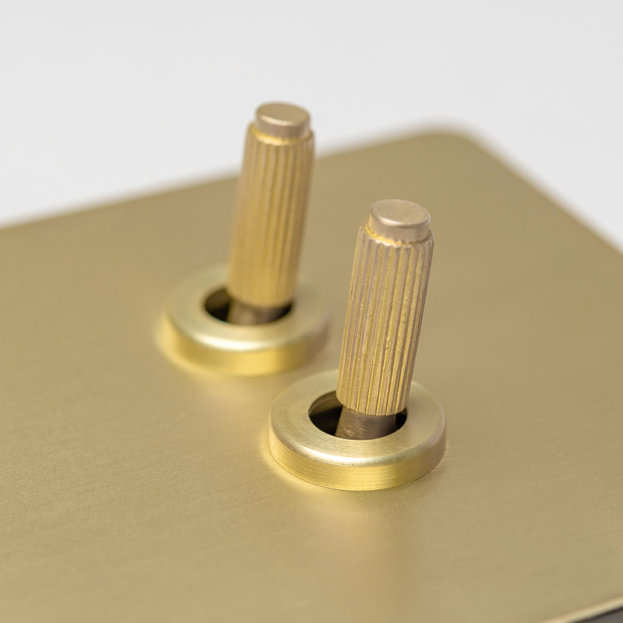Satin Brass Straight Knurled Switches and Sockets (2 gang intermediate switch) โ image 1