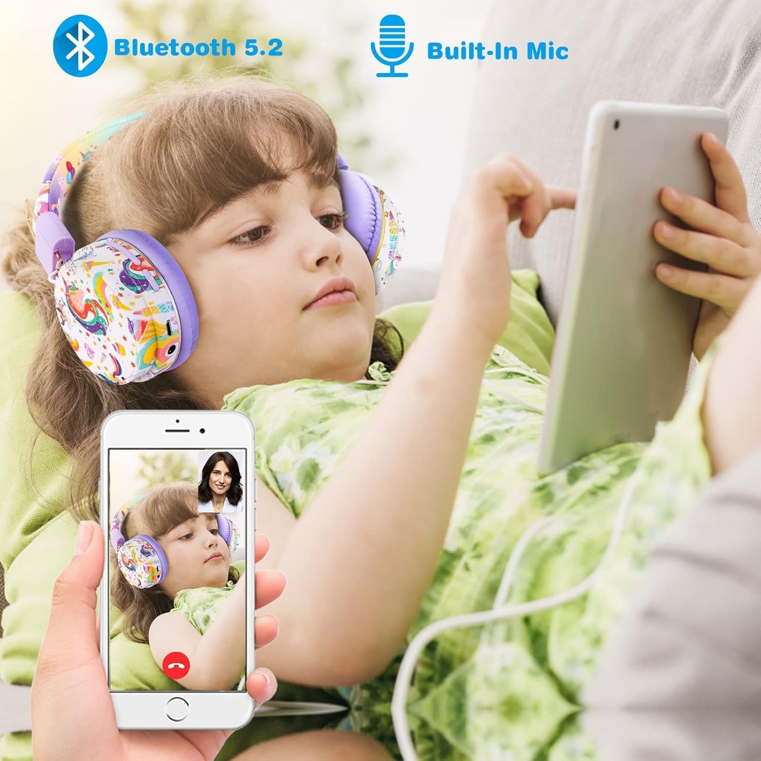 Child wearing QearFun Unicorn Headphones while using a tablet, with a phone showing a video call.