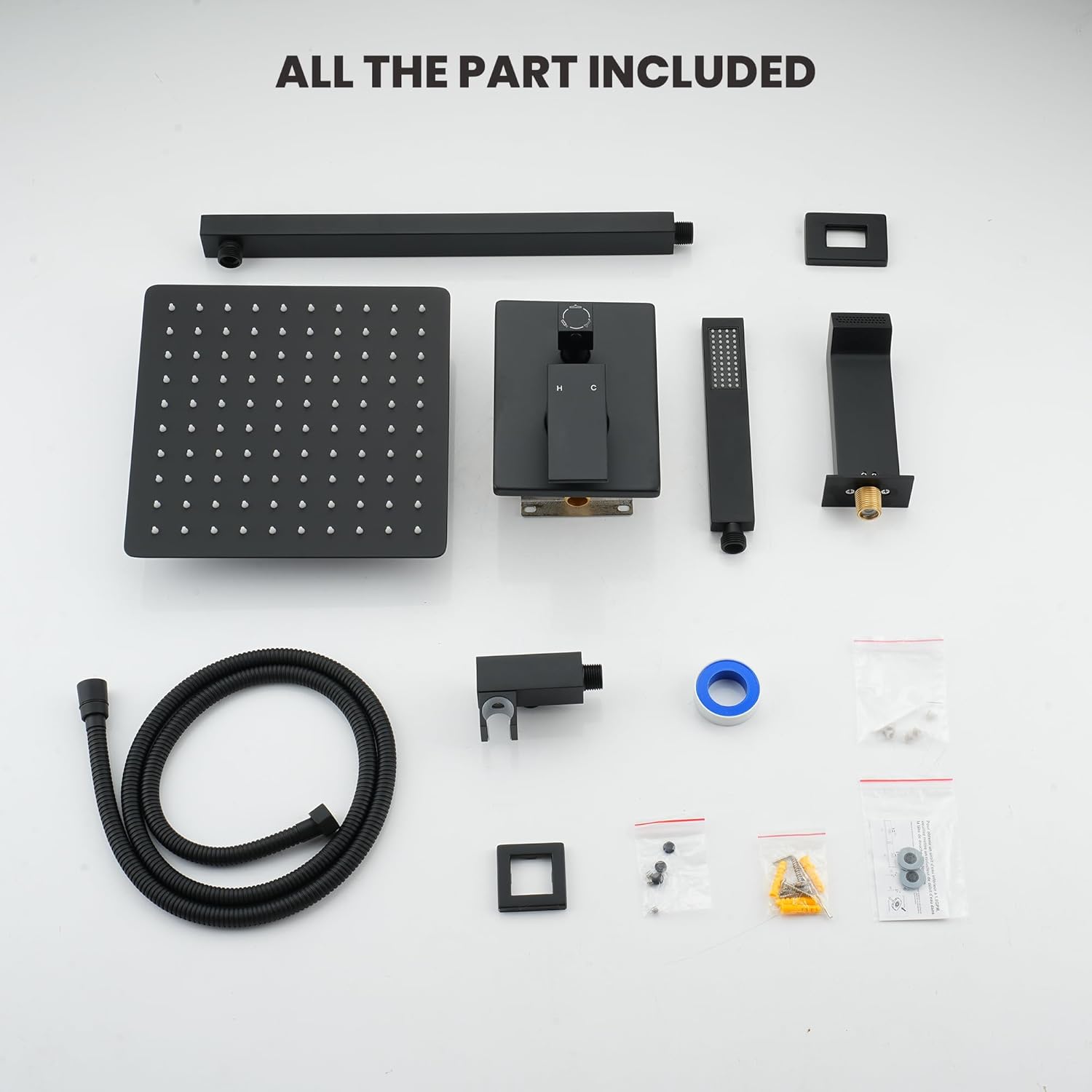 All components of the MONDAWE shower system laid out on a white surface.