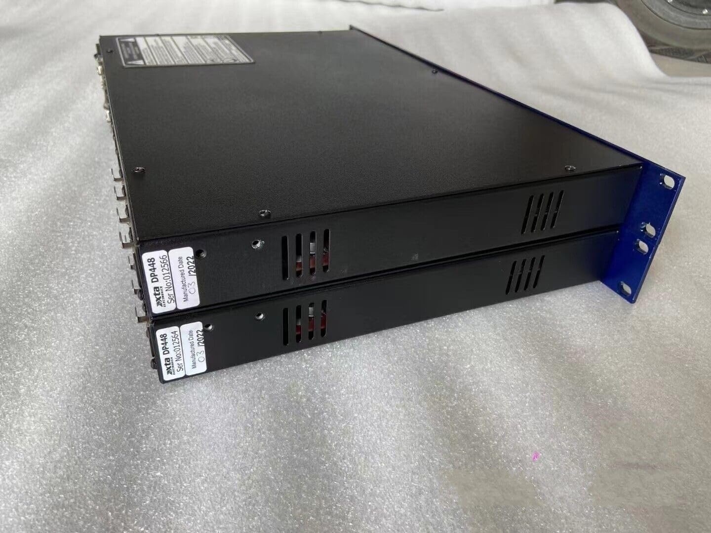 Side view of the XTA DP448 Audio Processor, showing ventilation grilles on the side panel.