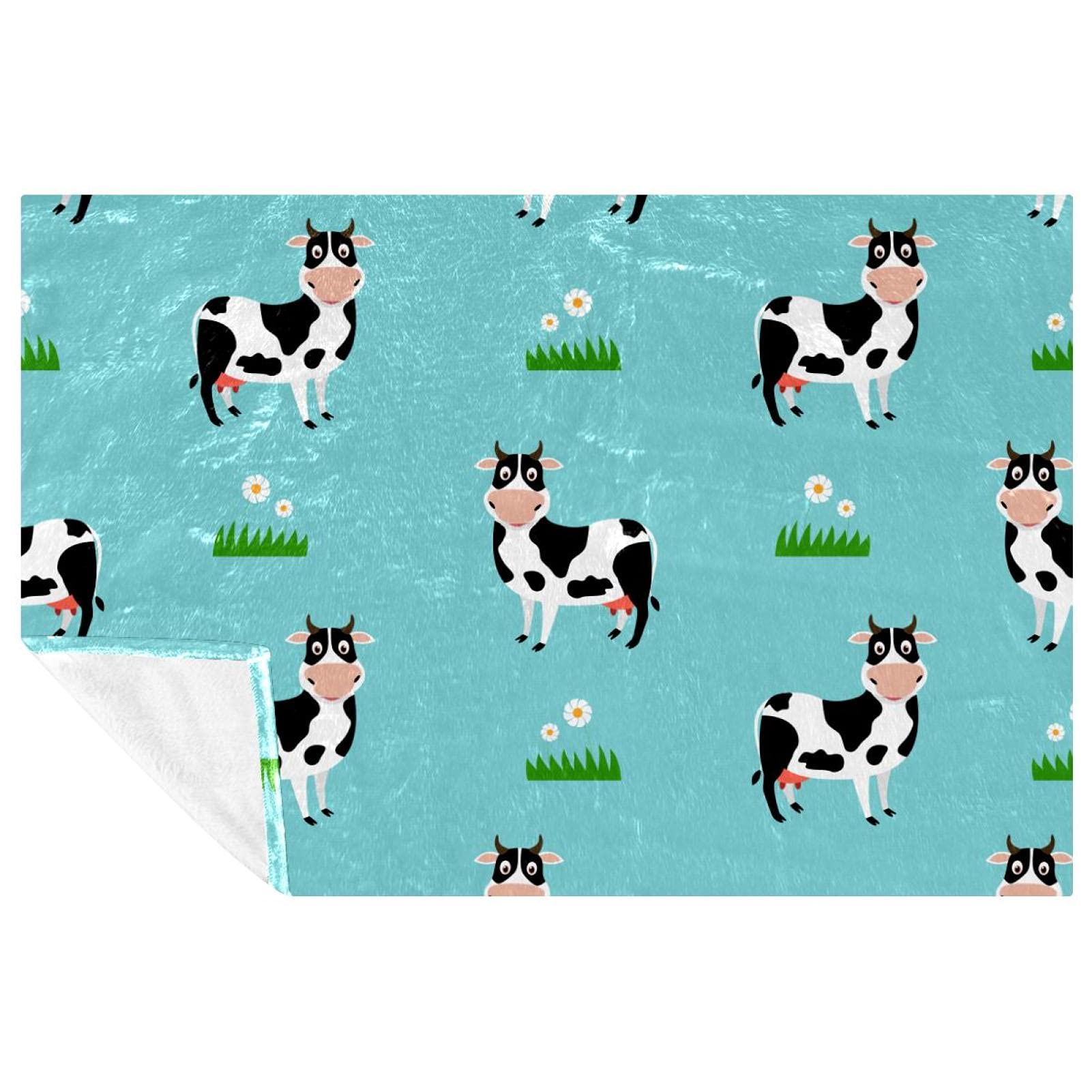 Couverture douce motif vache : un cocon de chaleur réconfortant pour vos moments en famille