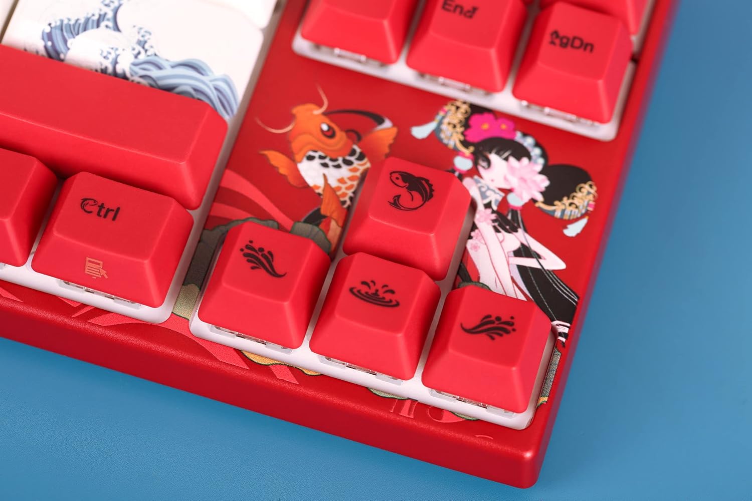ക്ലോസ് അപ്പ് view of the special keycaps on the Varmilo MA Series V2 Koi keyboard, highlighting the detailed Koi fish and other artistic designs.