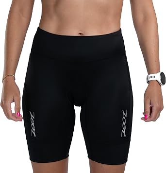 Zoot Women Core 8-Inch Tri Shorts ، أداء جاف سريع Triathlon Short with Cycling Chamois Pad ، Pockets & UPF 50 + Fabric