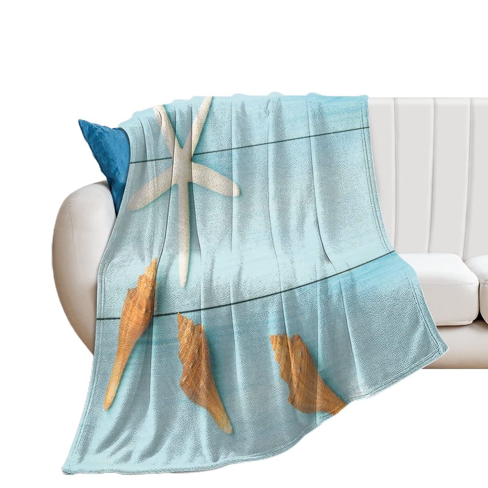 Couverture coquillage en flanelle pour des soirées cocooning au salon
