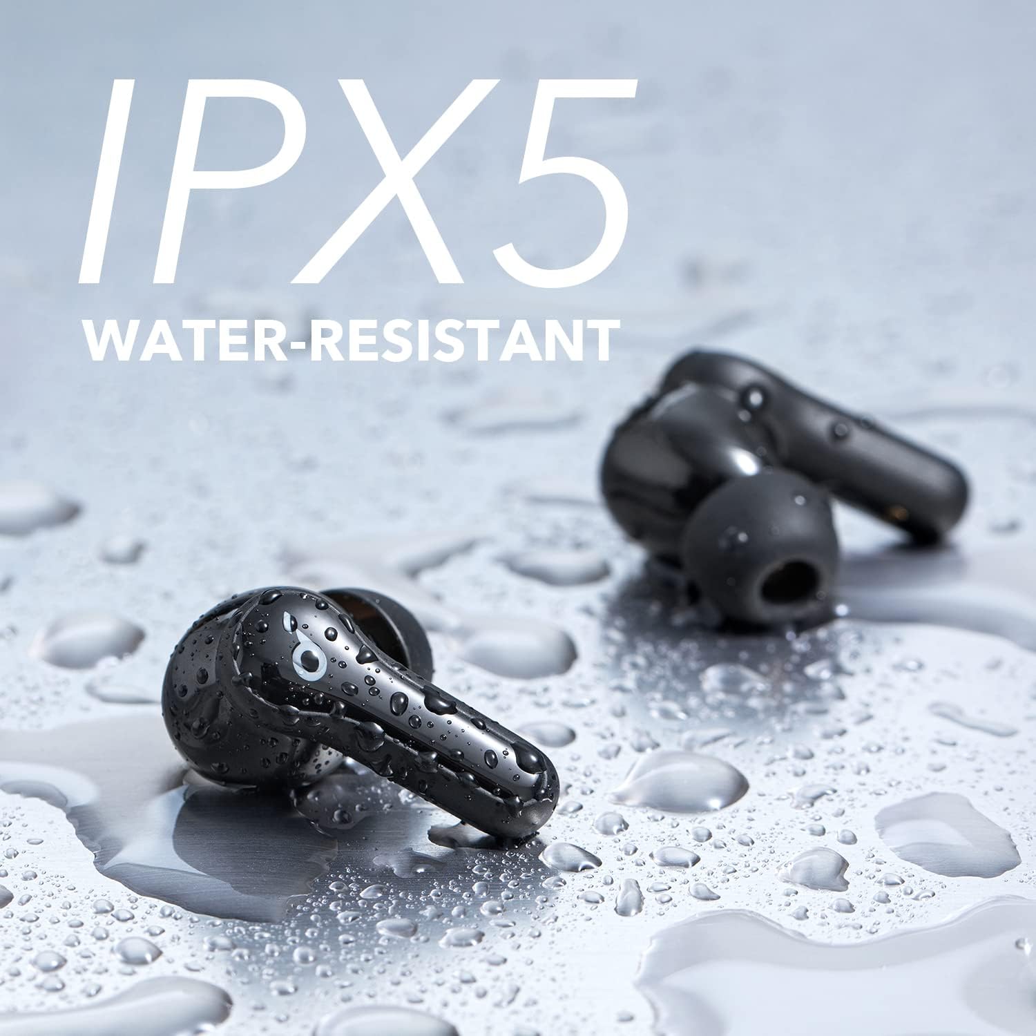 Soundcore Life Note E Earbuds with water droplets, illustrating IPX5 water resistance