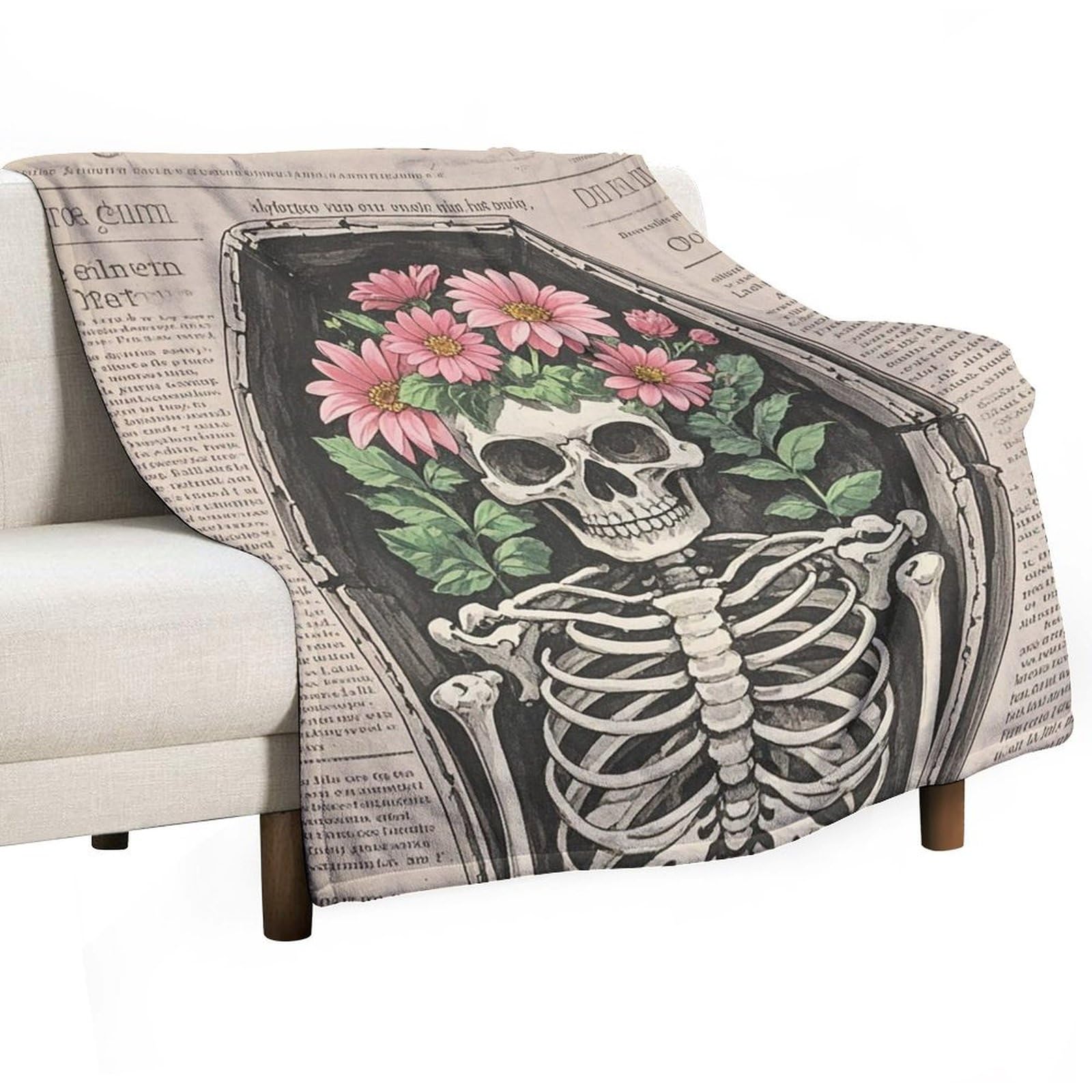 Plaid squelette fleurs en flanelle pour vos soirées cocooning sur le canapé