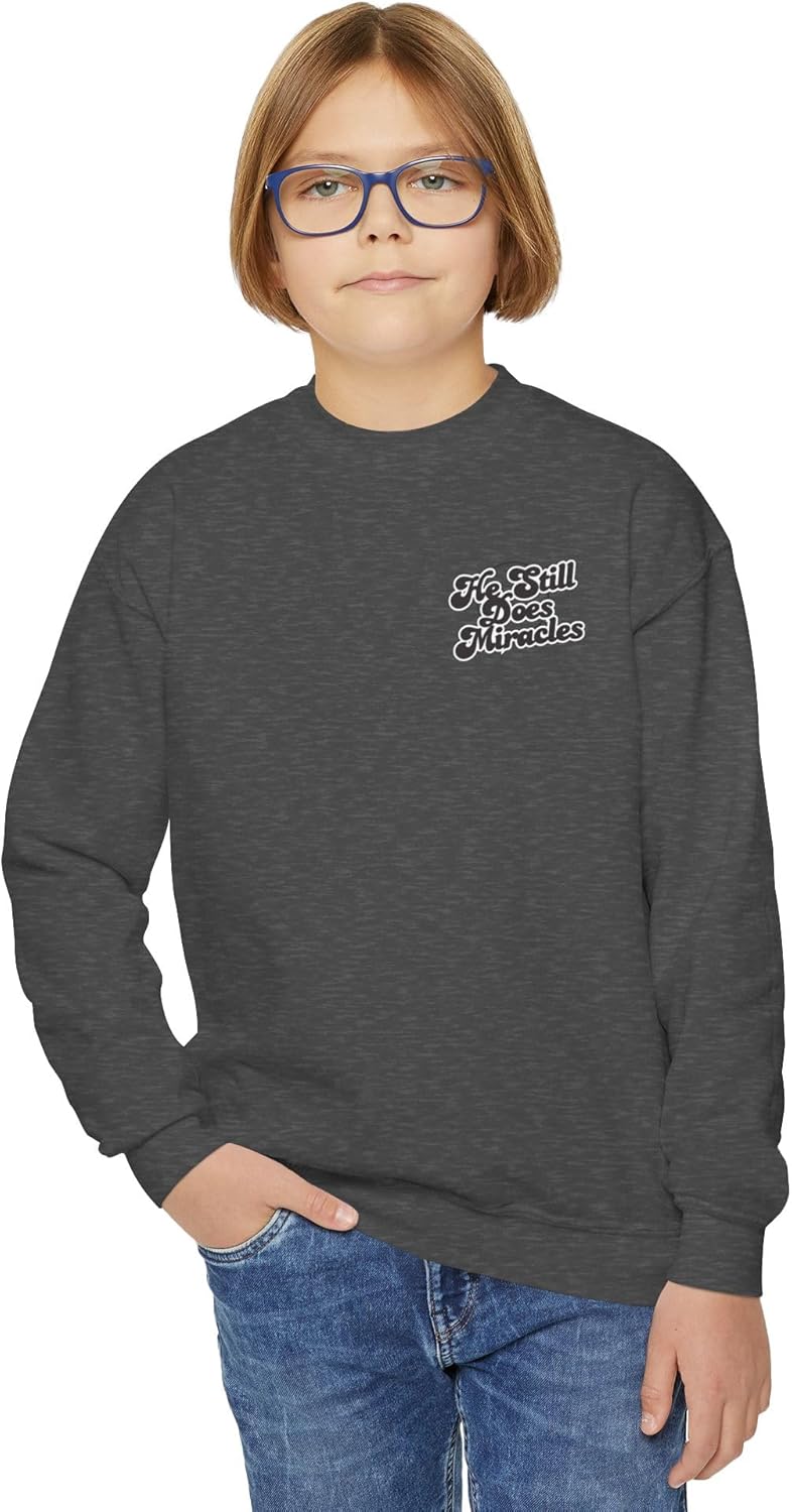 Boys Youth Crewneck Sweatshirt — He Still Does Miracles Christian Graphic Pullover.