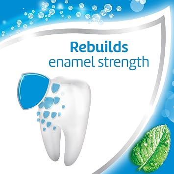 Aquafresh Fresh and Minty Fluoride Toothpaste, Triple Protection, Rebuilds enamel Strength, Helps protect gums* and Refreshes breath, 75ml