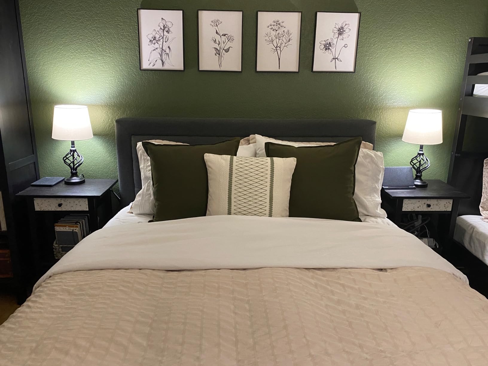 Botanical wall art styled on a bedroom wall