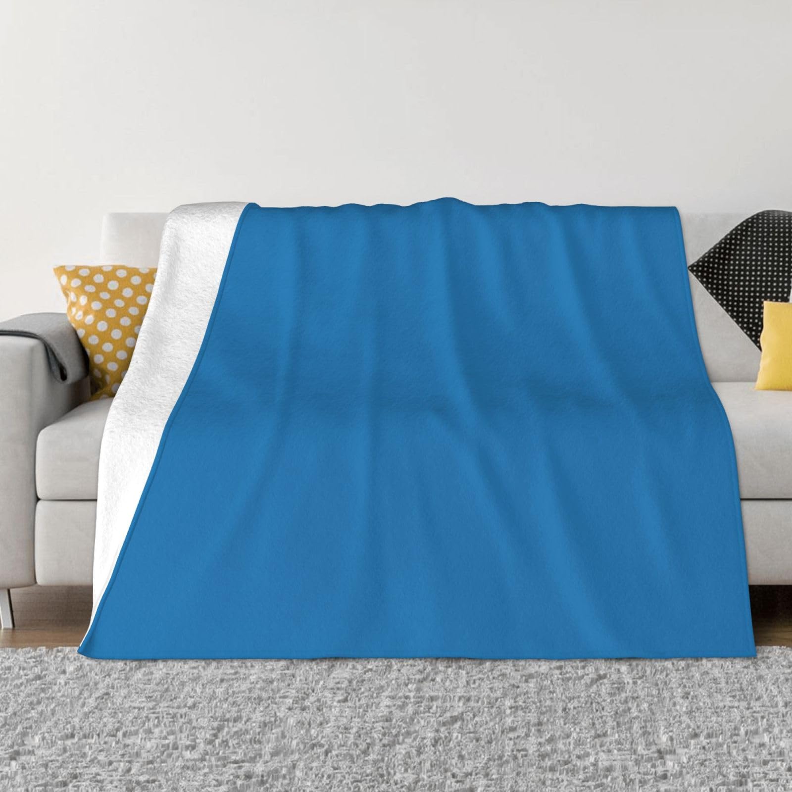 Couverture de canapé chaude en flanelle bleu ciel contre les nuits fraîches