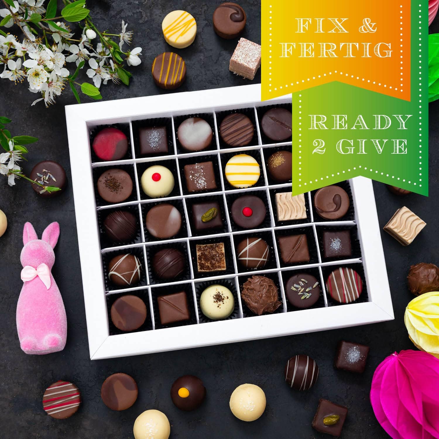 Hallingers Genuss Manufaktur Pralinen Oster-Geschenk - ohne Alkohol, handmade aus Confiserie-Edelkakao in wertiger XXL-Geschenkbox "Hasenfamilie", Ostern Körbchen für Frauen Männer