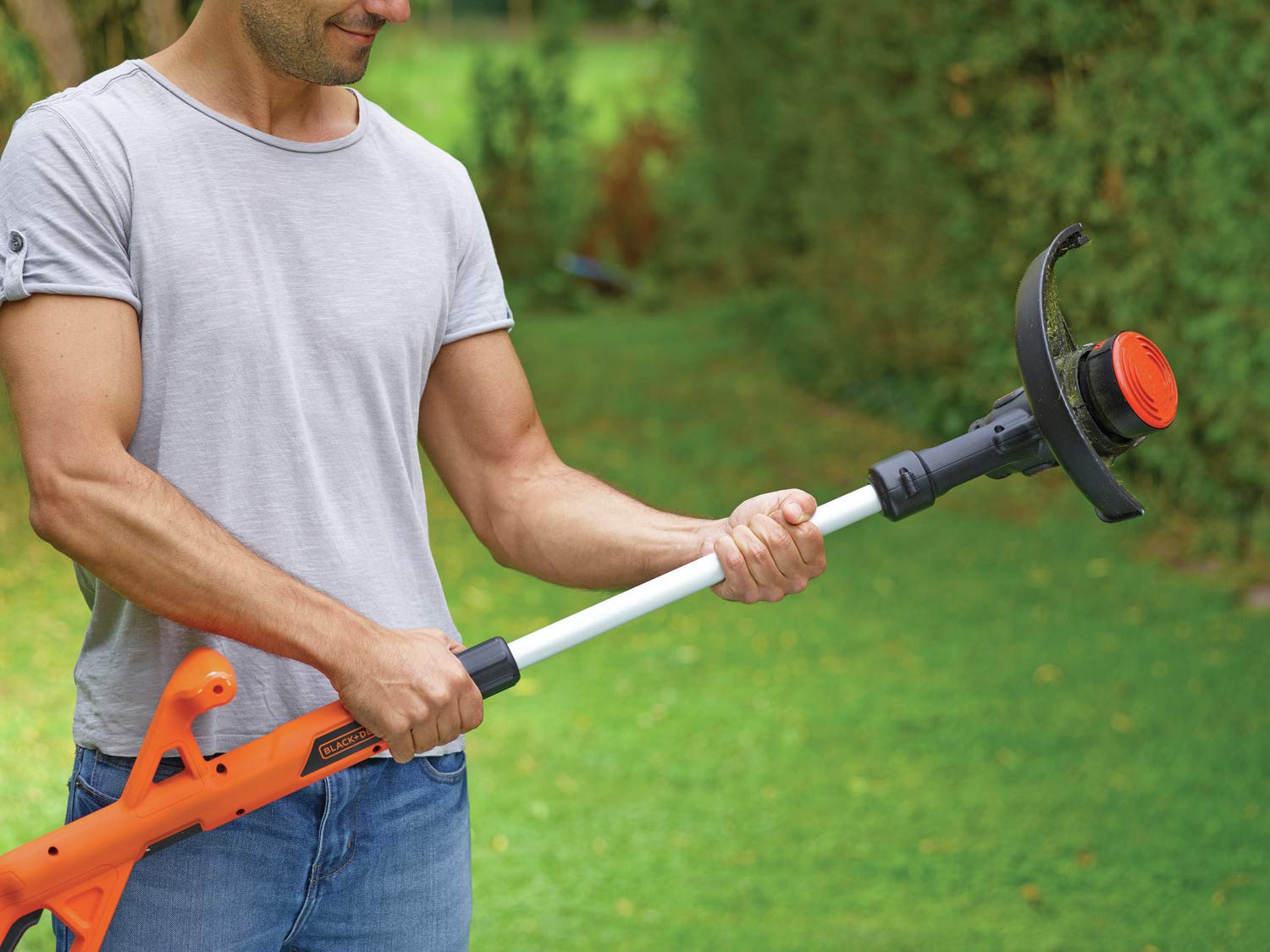 Black+Decker Akku-Rasentrimmer ST182320 (18V 2,0Ah, 25 cm Schnittbreite, AFS Reflex automatische Fadenverlängerung, für kleine und mittlere Gärten, inkl. Akku und Ladegerät)