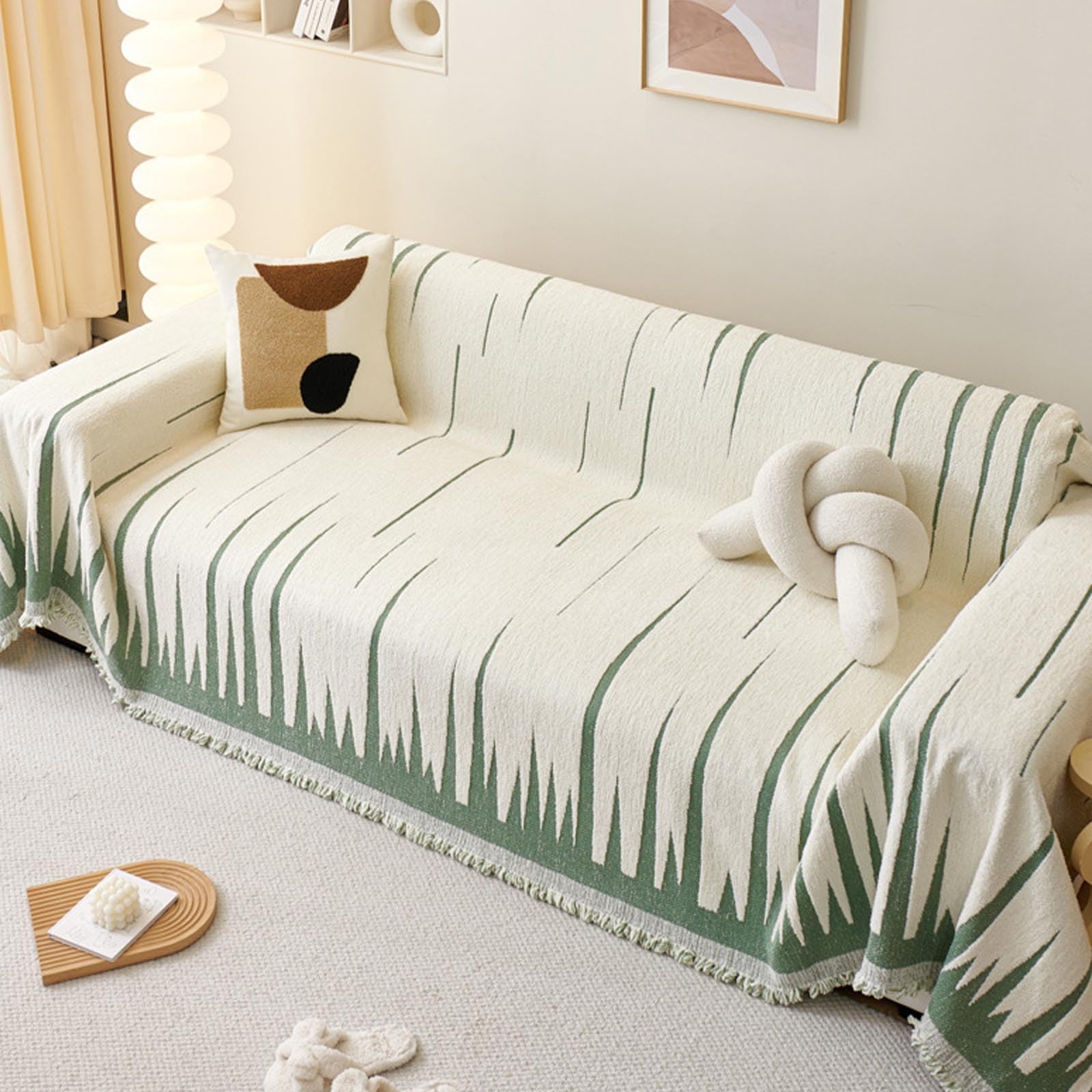 Couverture protection canapé verte en chenille pour moments cocooning en famille