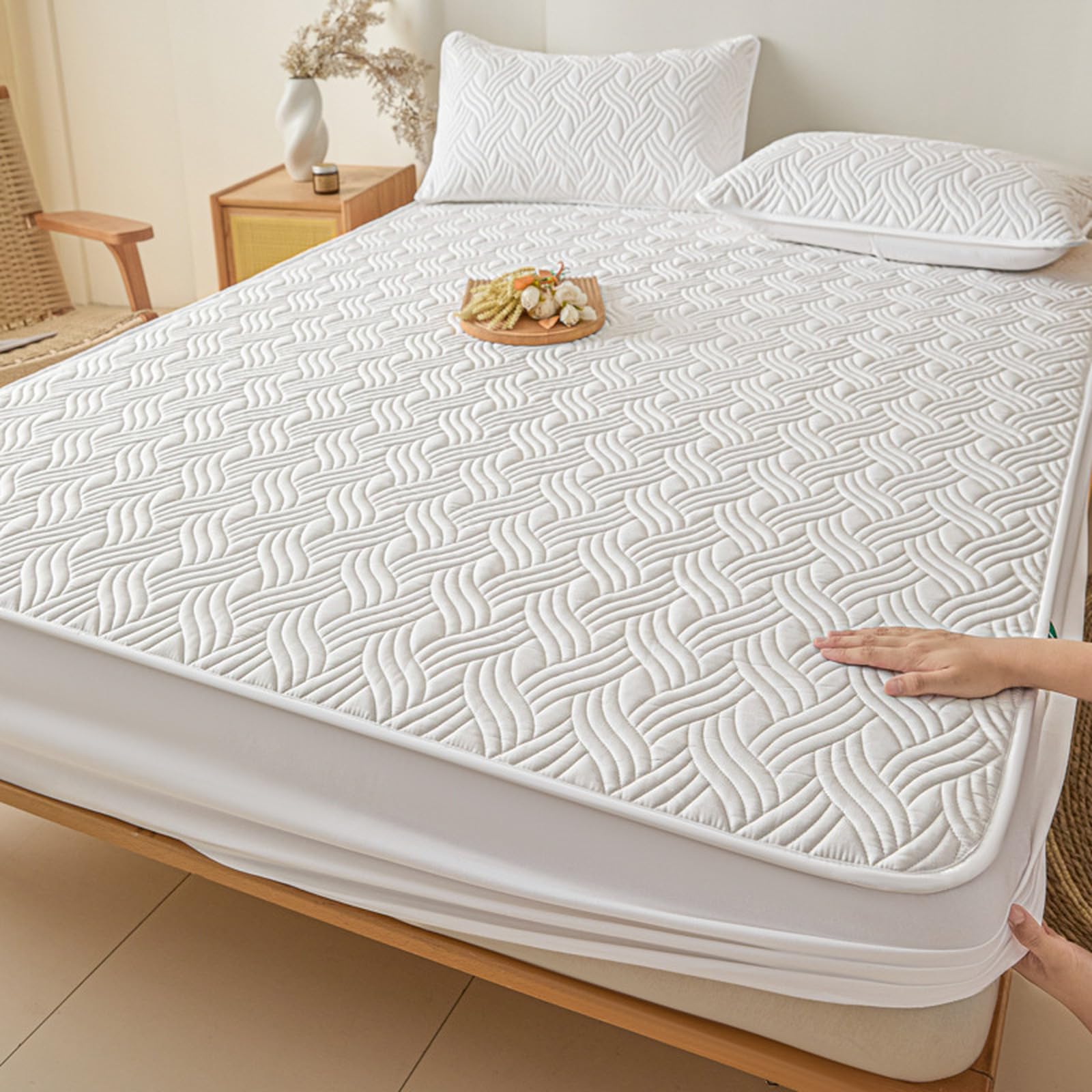 Protège matelas imperméable 180x200 pour protéger le lit familial des petits accidents