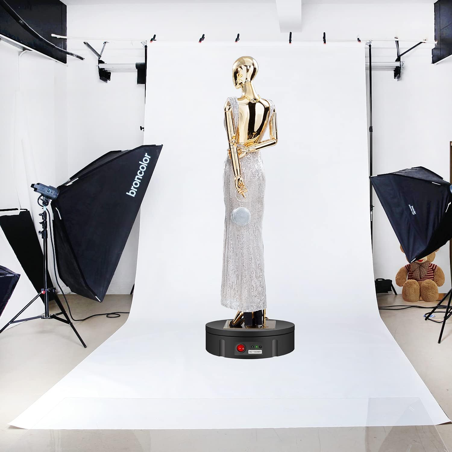 JAYEGT rotating display stand with a mannequin in a professional studio setting