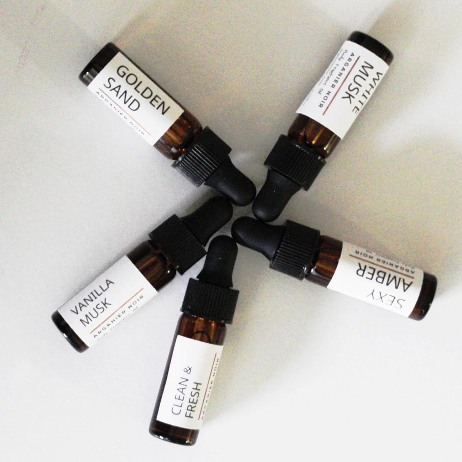 Arganier Noir Fragrance Discovery Set Mini Fragrance Body Oil Golden Sand, White Musk, Amber, Vanilla Musk. (Set of 5) 1 Dram perfume Oil.