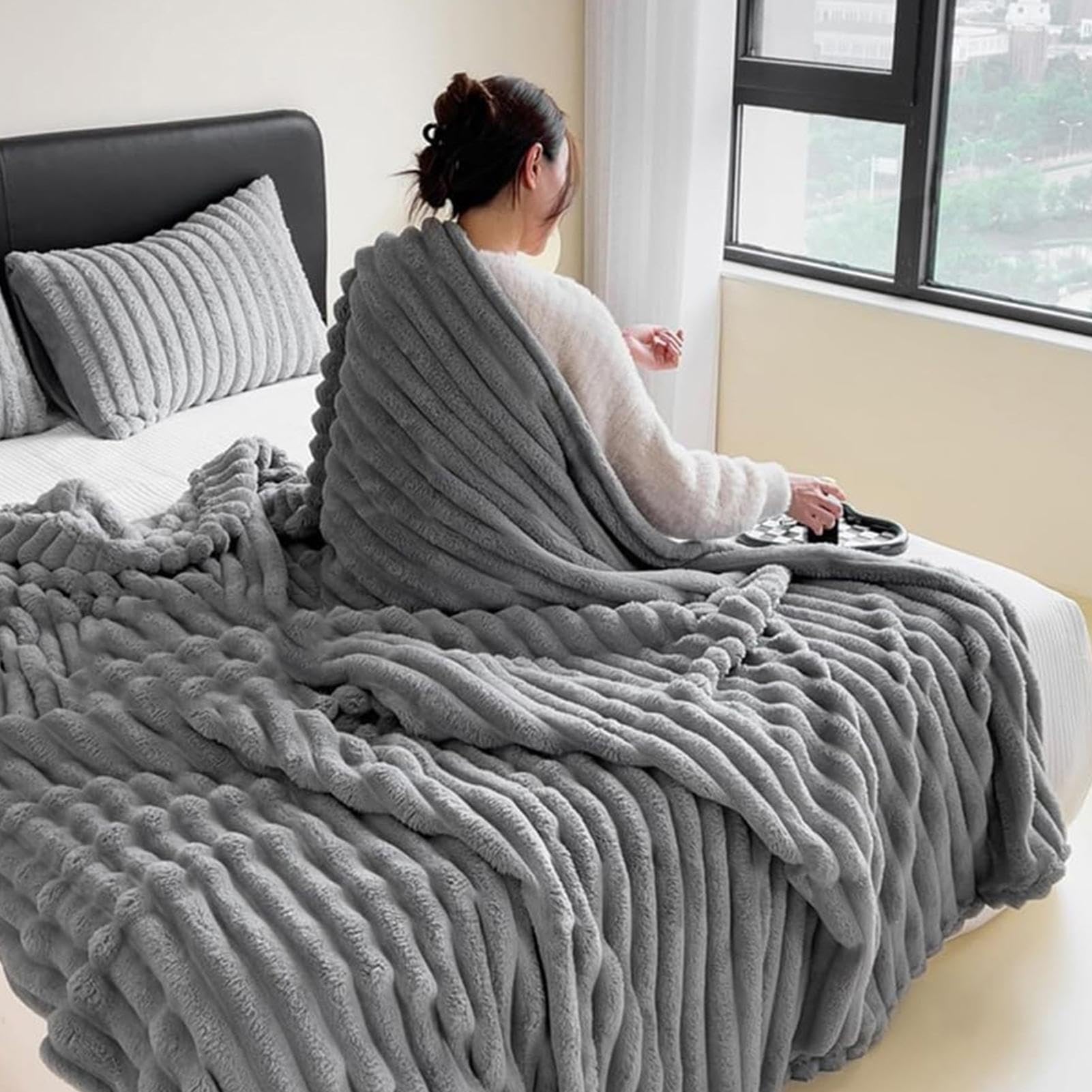 Couverture antistatique en fausse fourrure contre le froid pour canapé et lit