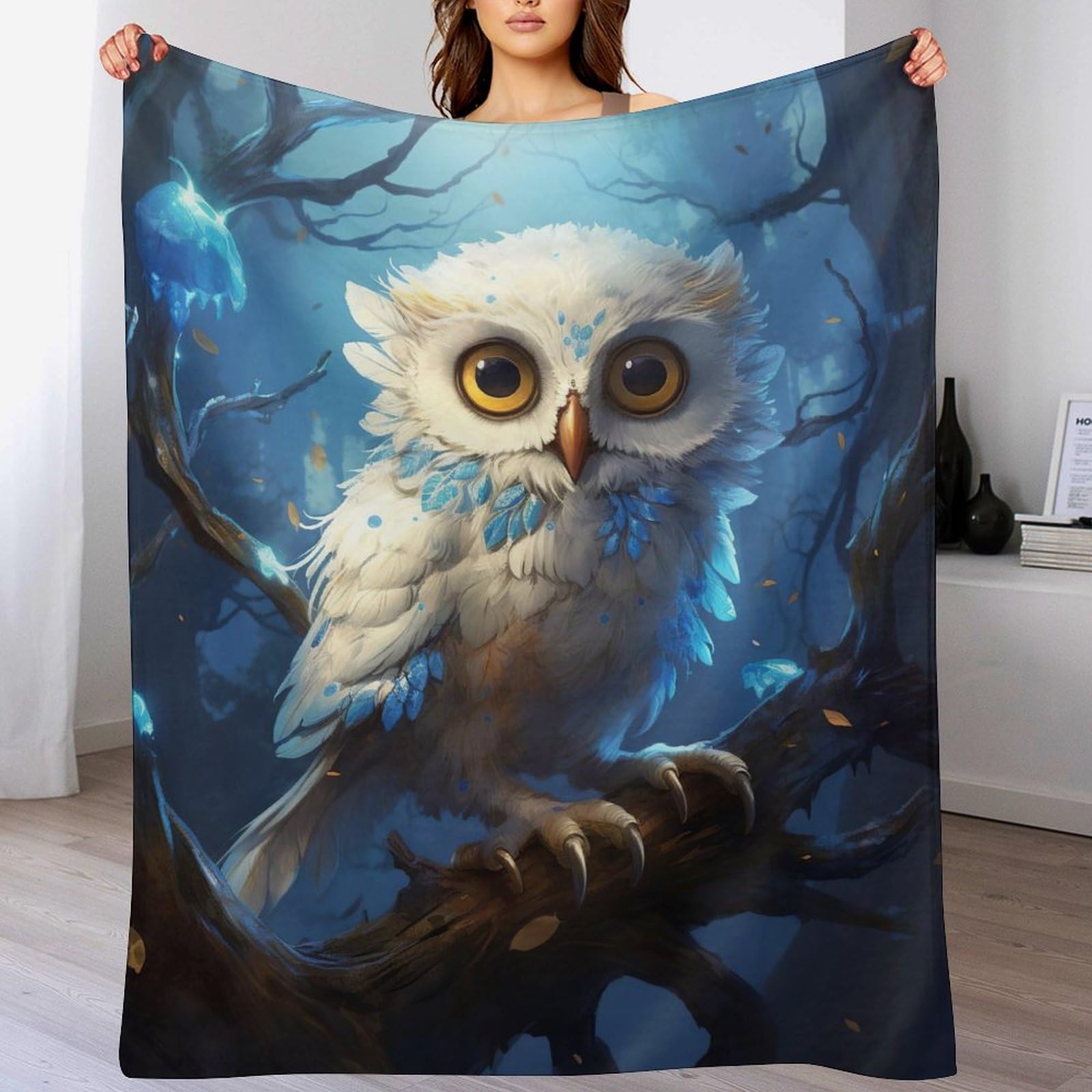 Couverture chaude flannel hibou contre le froid sur le canapé