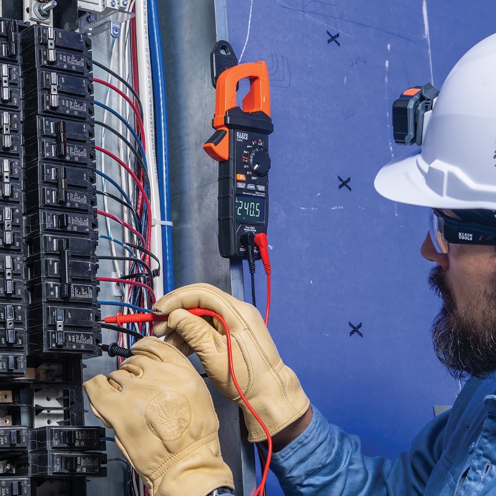 Electrician Uses Klein Clamp Meter to Test Circuit