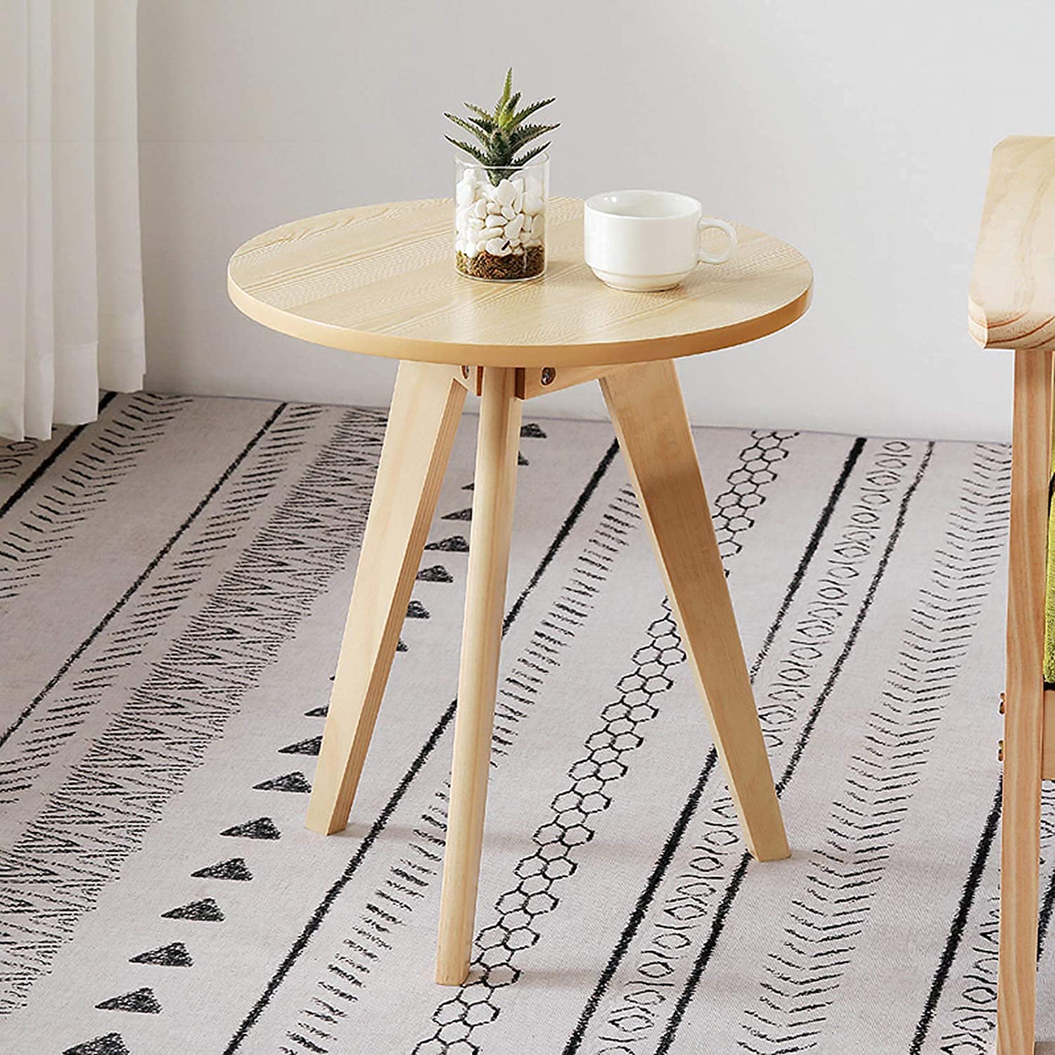 Petite table ronde en bois massif au design épuré et plateau de rangement durable