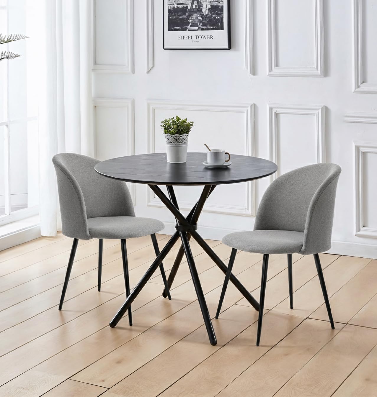 Mesa de comedor redonda de 90cm con sillas de respaldo curvado