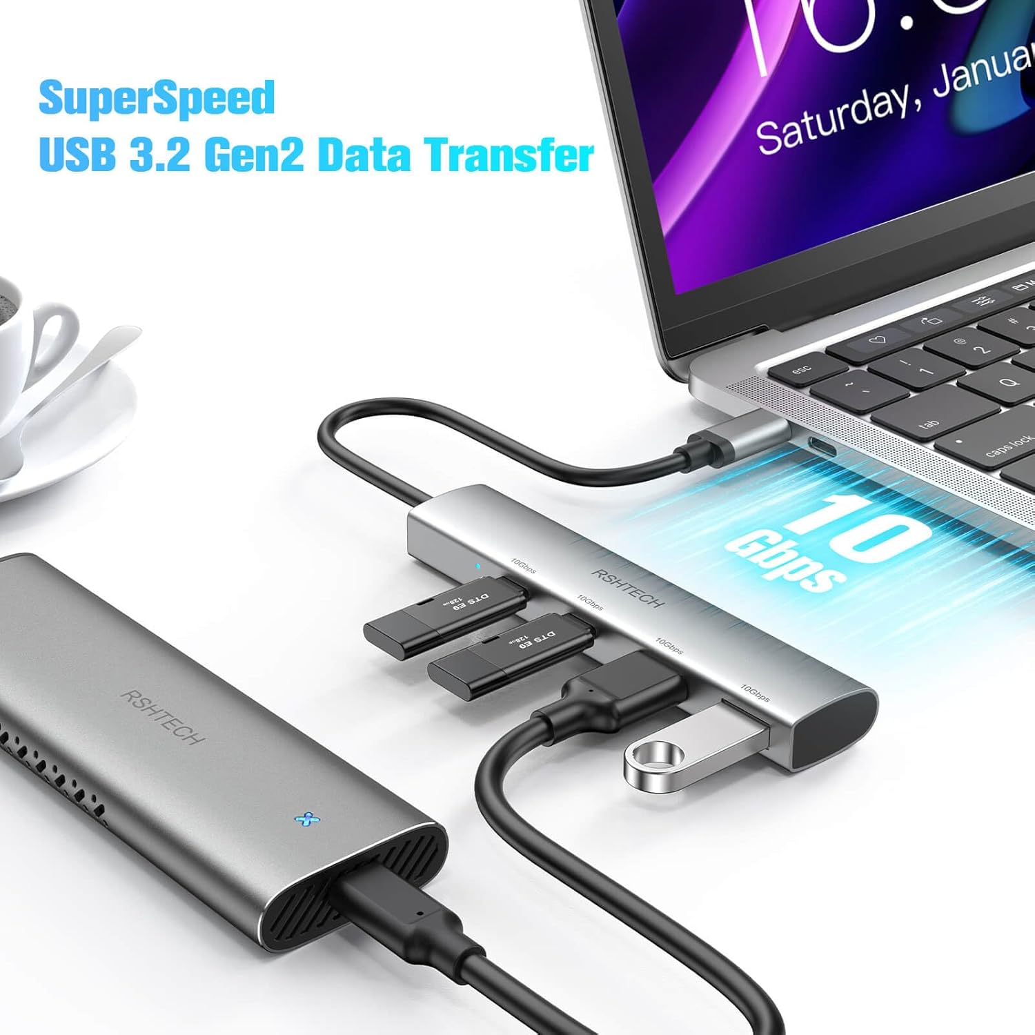 Laptop connected to RSHTECH USB C Hub, demonstrating 10Gbps data transfer speed.