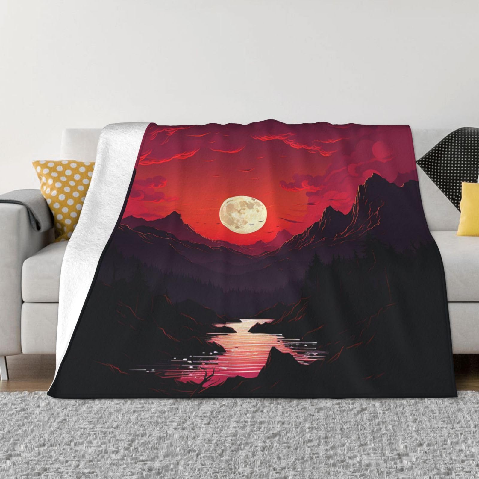 Couverture polaire douce et chaude rouge coucher de soleil pour vos soirées canapé