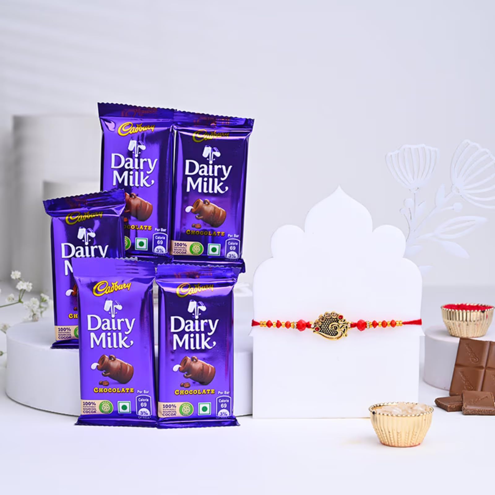 FlowerAura Raksha Bandhan Celebrations Divine Om Rakhi With Set of 5 Chocolate - Gift for Brother, Bhai, Cousins & Raksha Bandhan Gift (Same Day Delivery) (B0DCBNP7Q9) Amazon Price History, Amazon Price Tracker
