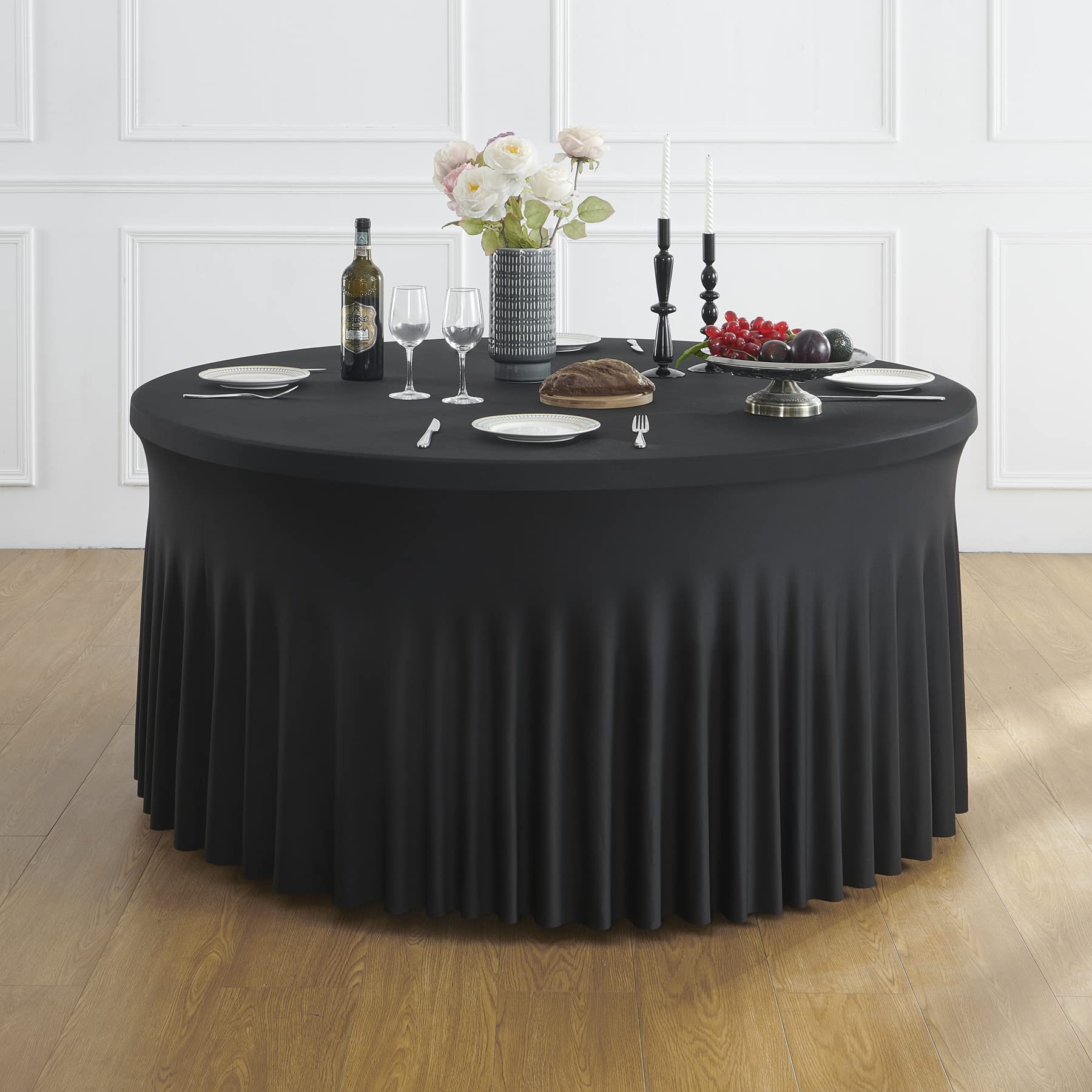 Nappe ronde extensible noire 150 cm anti-pli pour masquer les pieds de table