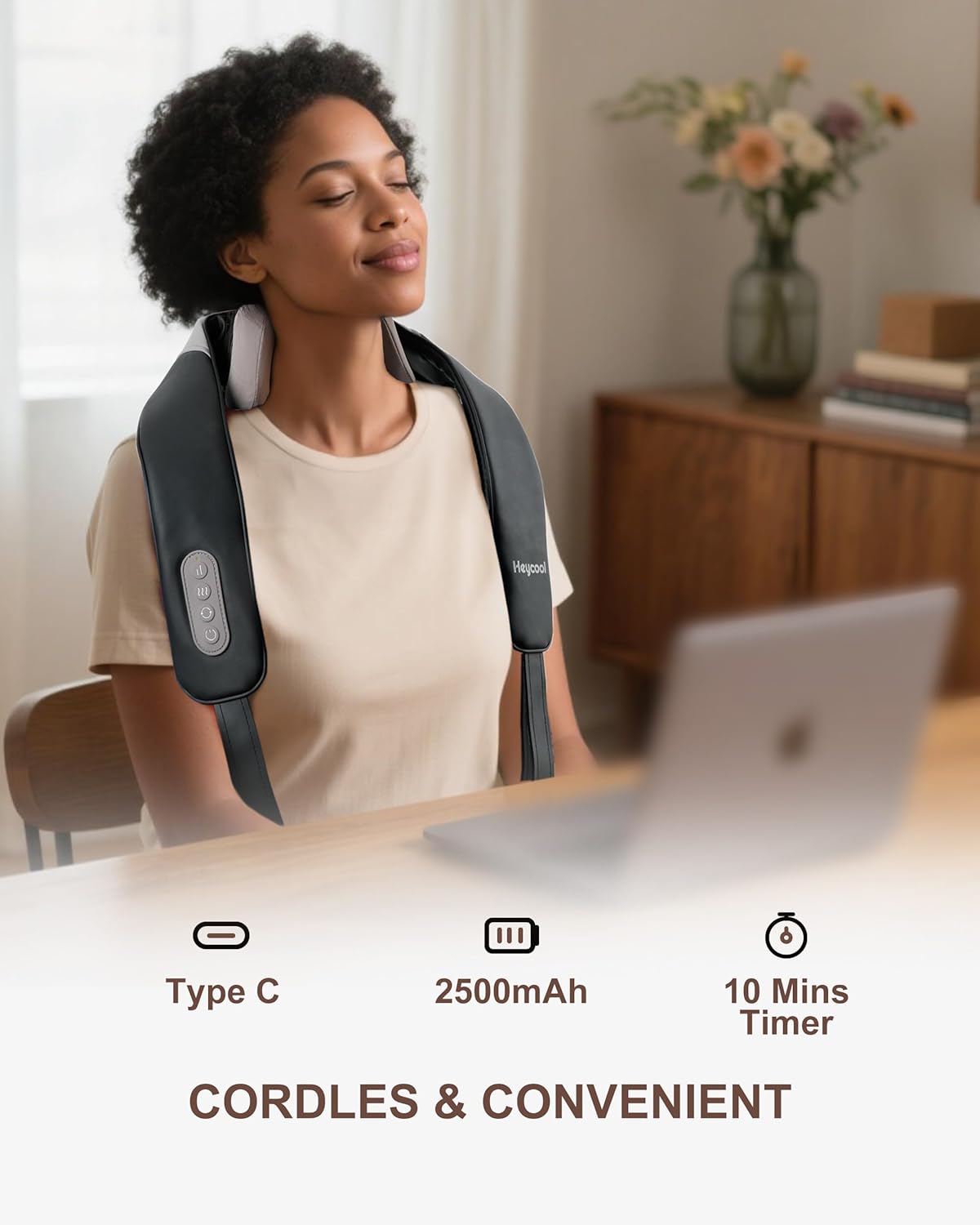 Woman connecting a USB-C charging cable to the Heycool Neck Massager.