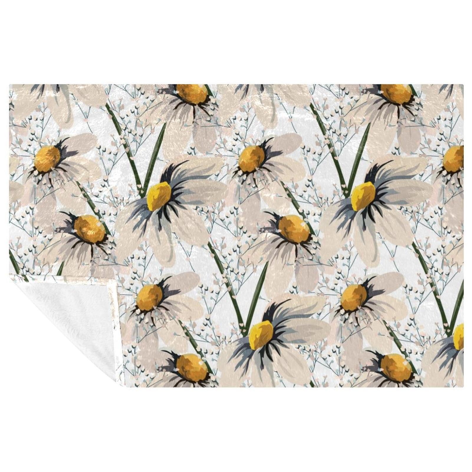 Couverture douce contre le froid frissons sur canapé lit et pique-nique motif camomille