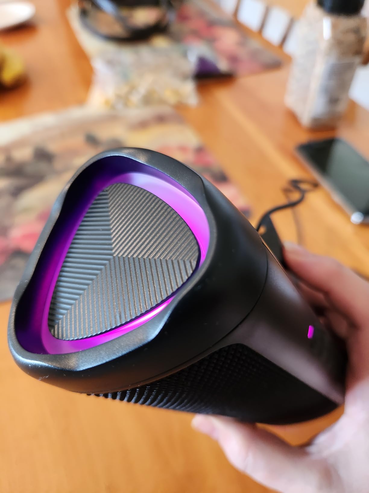 BolaButty speaker showing purple LED light ring