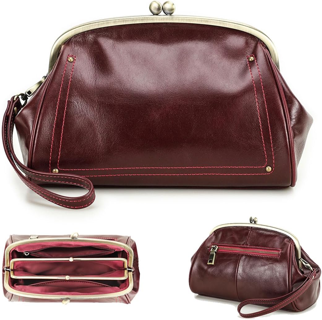 Womens leather evening clutch bag with kiss lock closure.