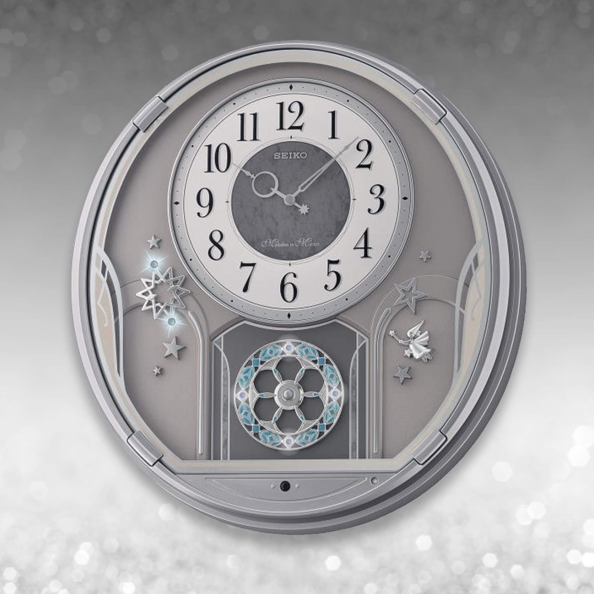 Amazon.com: Seiko QXM375SRH 18 Melodies In Motion Rotating