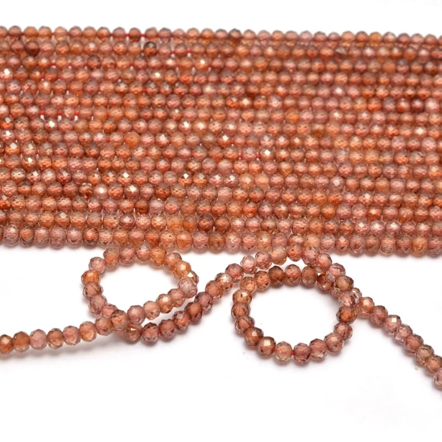 Zircon rouge naturel authentique pour éviter les imitations plastiques en création de bijoux
