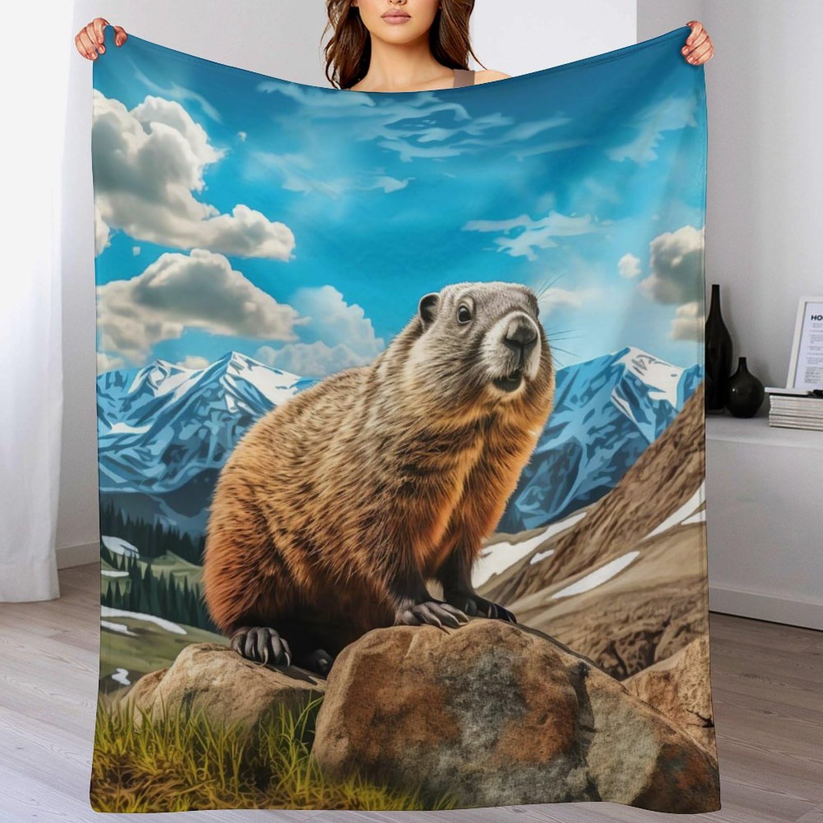 Couverture polaire marmotte pour vos soirées cocooning sur le canapé