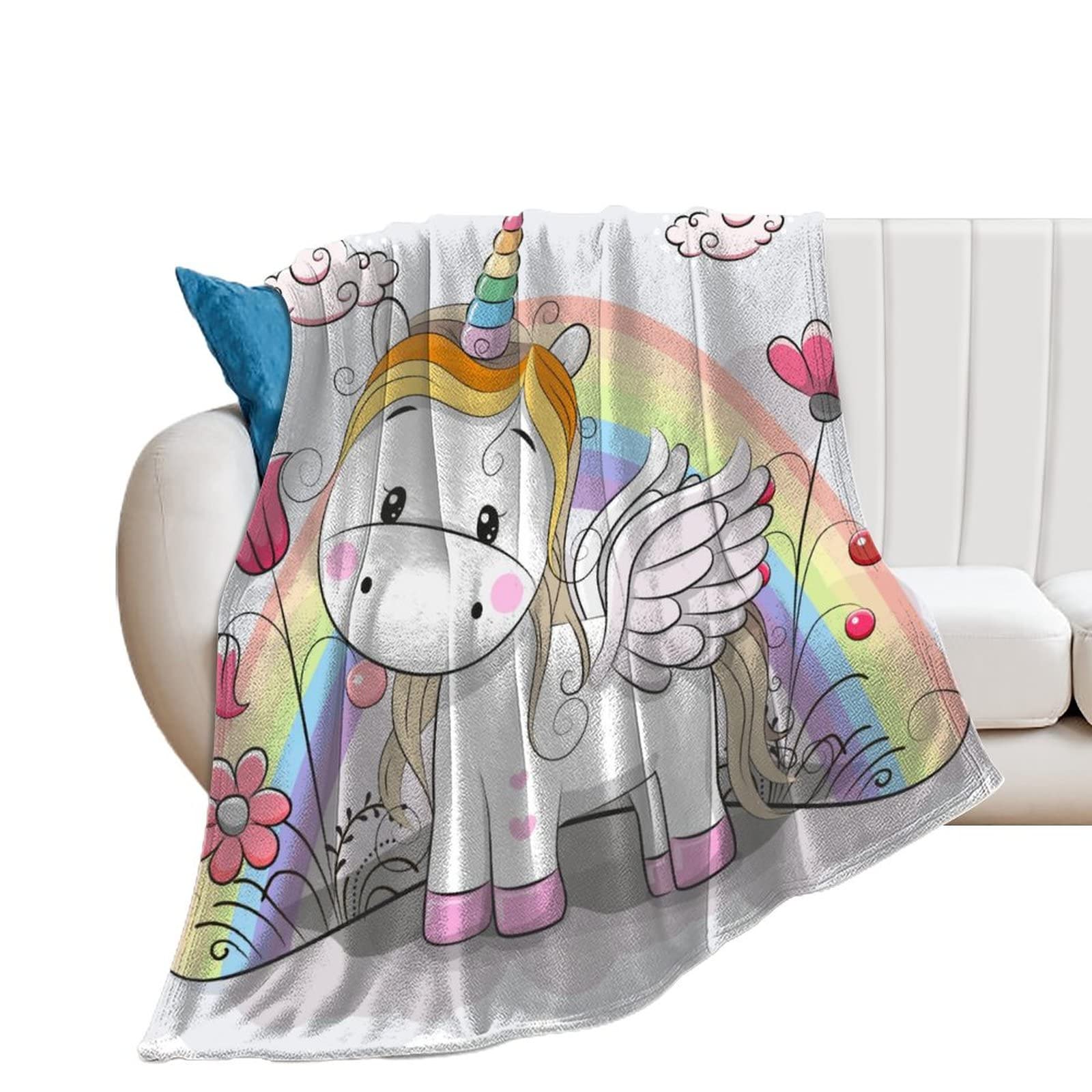 Couverture polaire licorne multicolore pour vos soirées cocooning au salon