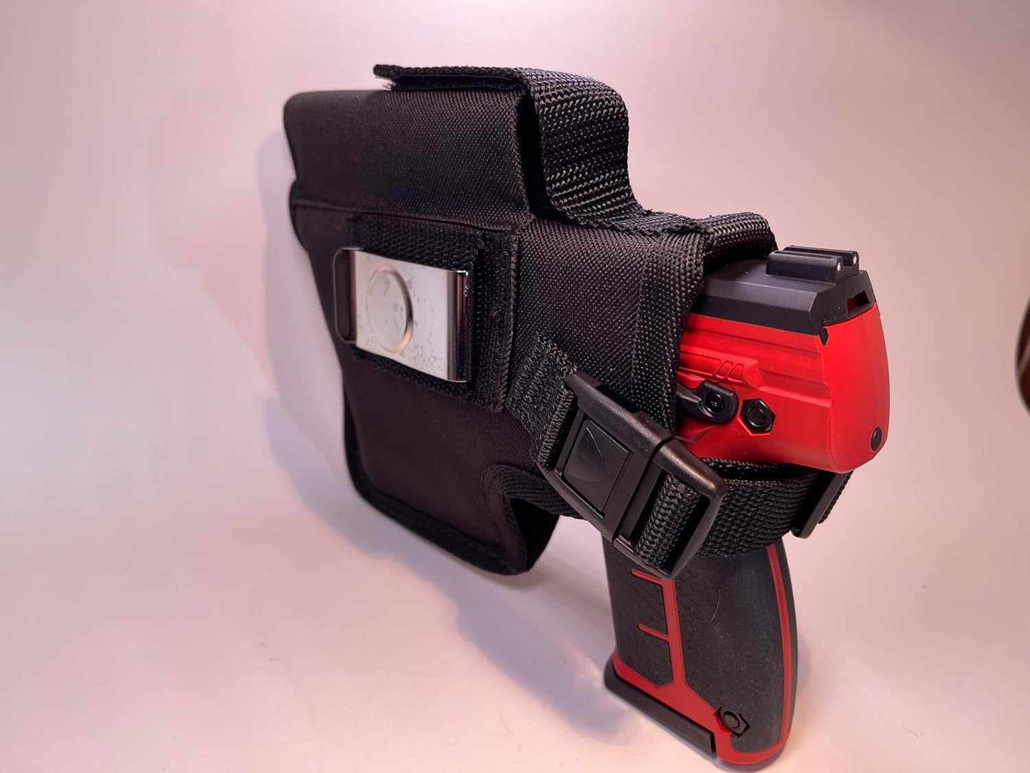Holster Compatible to fit The Byrna Model LE with an Optional Laser/Light Added Also has an Extra Magazine Pocket to Hold The Extra Mag.
