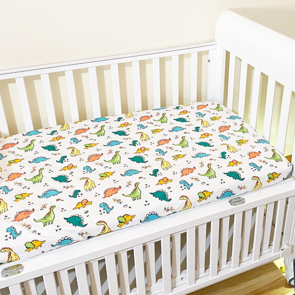 Odot Soft Cotton Cot Bed Sheets, Cartoon Bedside Cribs Fitted Sheets for Boys Girls, Newborn Bassinet Sheets, Baby Bed Sheets Stretch Edge Mattress Protector Easy Care (130x70cm,Dinosaur 1)