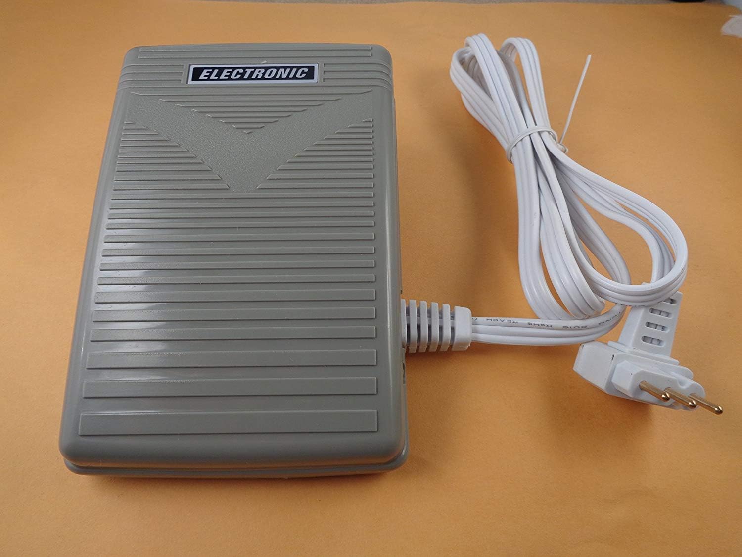 NGOSEW Foot Control Pedal connected to a power source