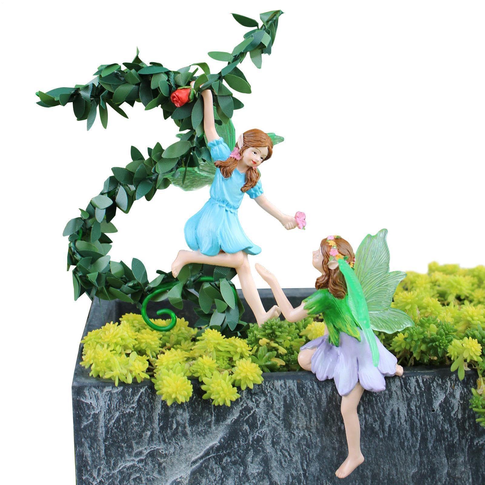 Sculpture de collection phosphorescente et mini fées pour décoration extérieure