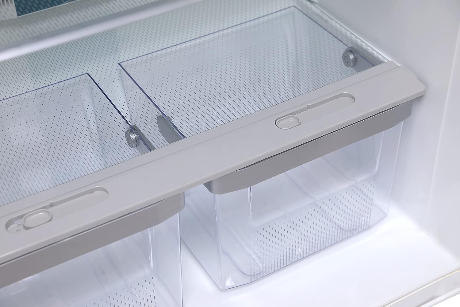 Close-up of transparent crisper drawers