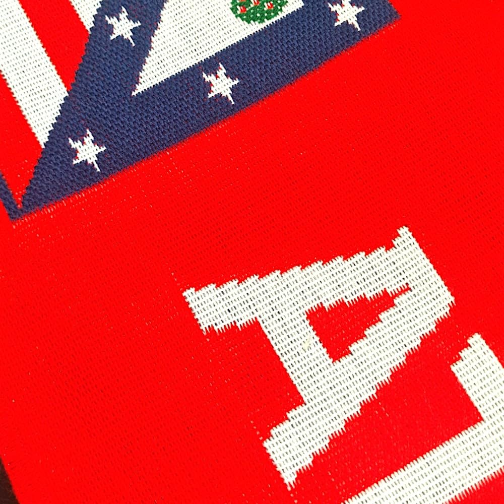 Sciarpa ufficiale dell'Atletico Madrid in colore rosso con stemma ricamato, ideale per sostenere la squadra con stile e orgoglio rossoblù.