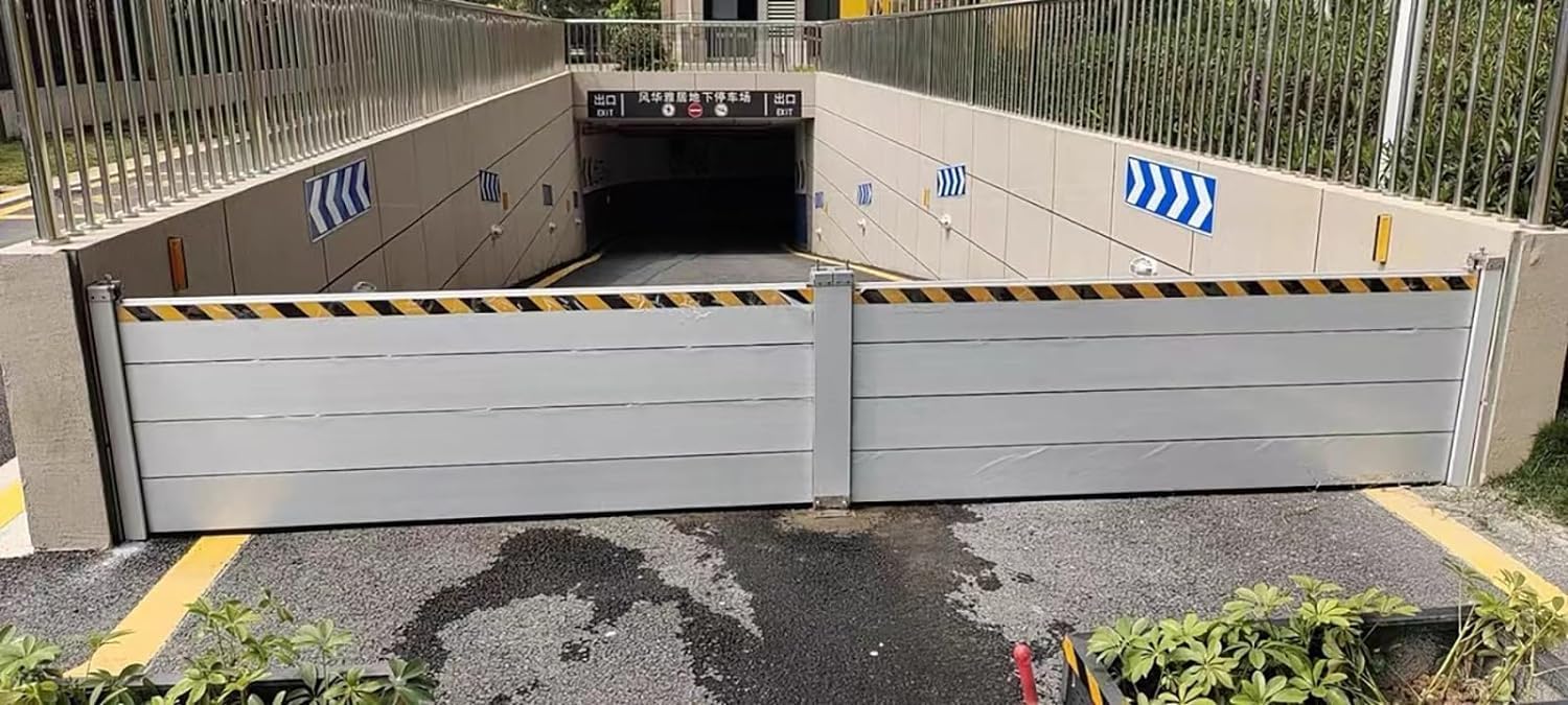 Barrière de protection contre les inondations et déflecteur de contrôle pour entrée de garage