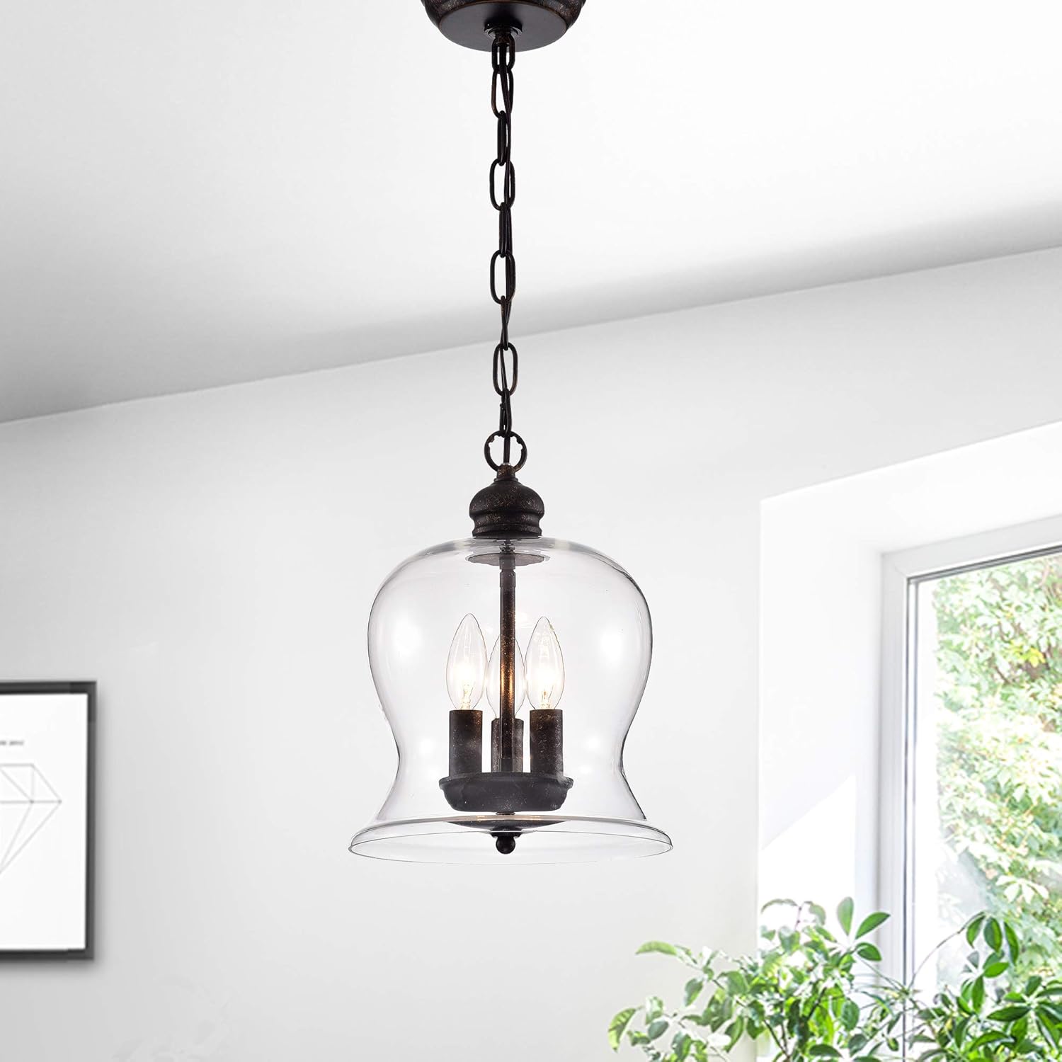 Warehouse of Tiffany Cadogan 3-Light Pendant installed in a room
